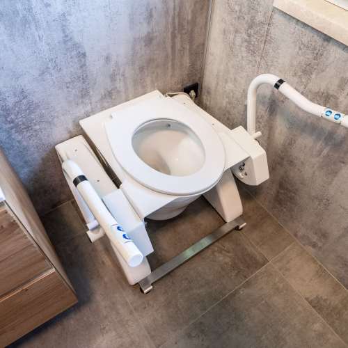 Elektronisch verstellbare Aufstehhilfe R2D2 mit Neigungsfunktion für sicheren Toilettengang